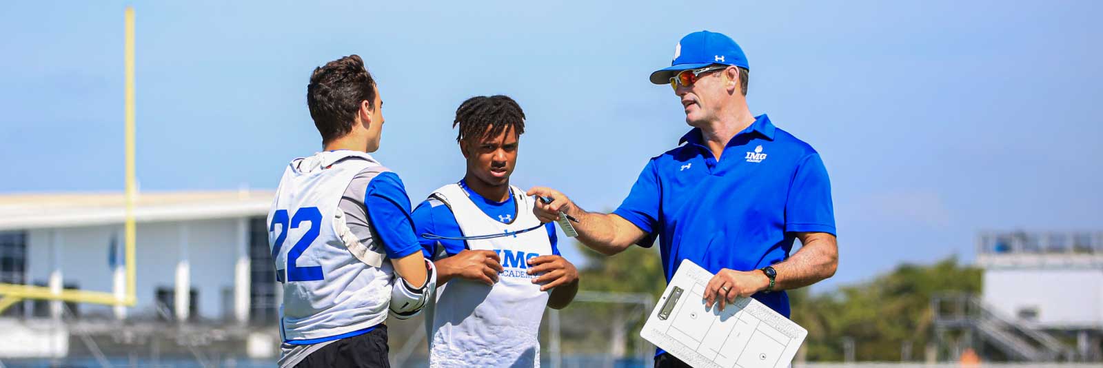 IMG football coach