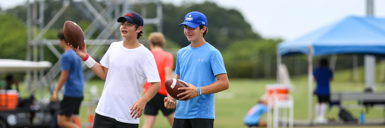 two football players at a combine